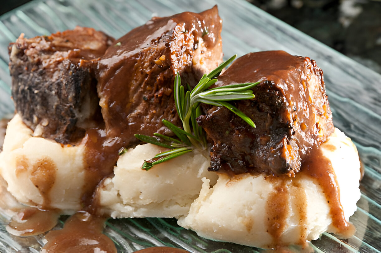 French Inspired Braised Beef Short Ribs, Glazed Carrots, Garlic Mashed Potatoes & Fruit Compote